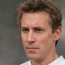 Neutral white adult male with short  brown hair and brown eyes