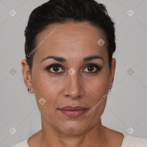 Joyful latino young-adult female with short  black hair and brown eyes