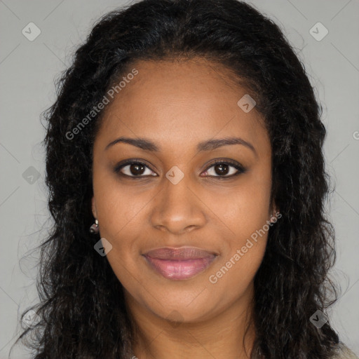 Joyful black young-adult female with long  brown hair and brown eyes