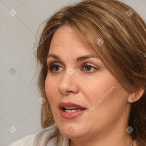 Joyful white adult female with medium  brown hair and brown eyes