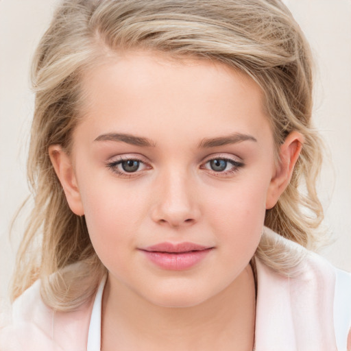 Joyful white child female with medium  brown hair and blue eyes