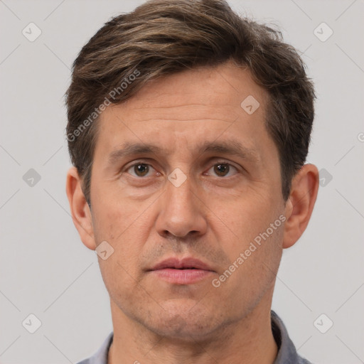 Neutral white adult male with short  brown hair and brown eyes