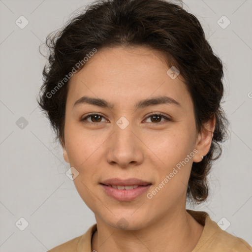 Joyful latino young-adult female with short  brown hair and brown eyes