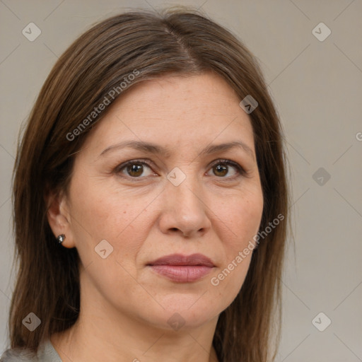 Joyful white adult female with medium  brown hair and grey eyes