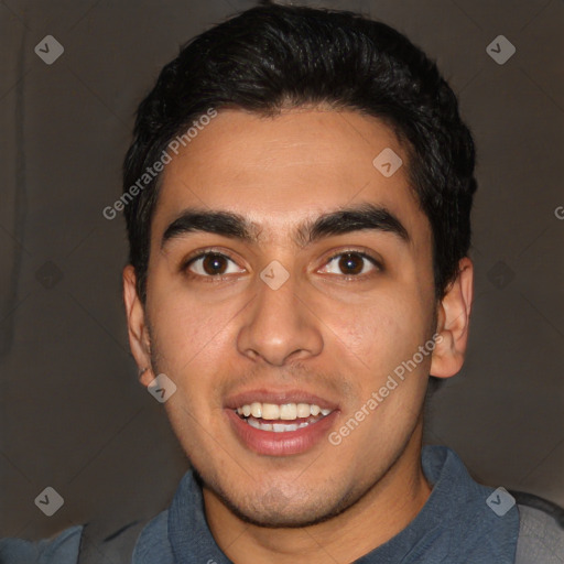 Joyful white young-adult male with short  black hair and brown eyes