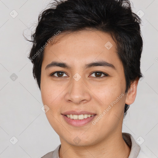 Joyful asian young-adult female with short  brown hair and brown eyes