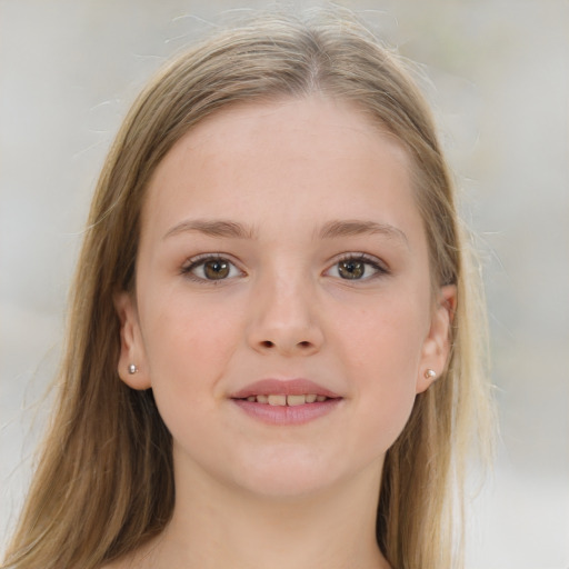 Joyful white child female with medium  brown hair and brown eyes