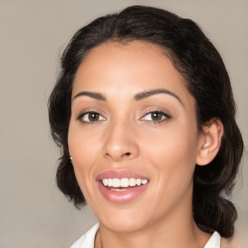 Joyful white young-adult female with medium  brown hair and brown eyes