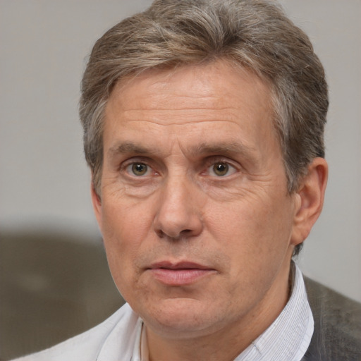 Neutral white middle-aged male with short  brown hair and brown eyes