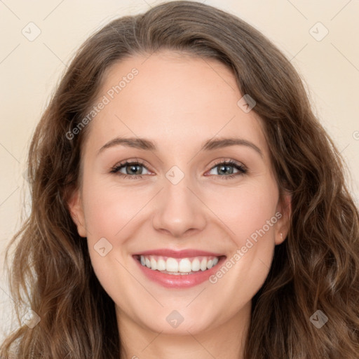 Joyful white young-adult female with long  brown hair and green eyes