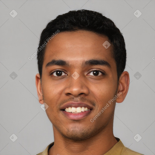 Joyful latino young-adult male with short  black hair and brown eyes