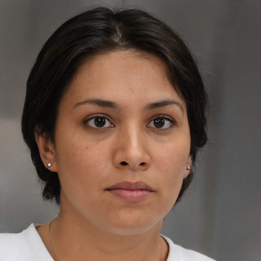 Neutral white young-adult female with medium  brown hair and brown eyes