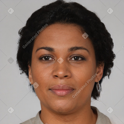 Joyful latino adult female with short  brown hair and brown eyes