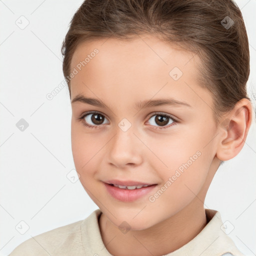 Joyful white child female with short  brown hair and brown eyes