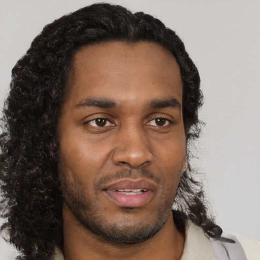 Neutral black young-adult male with short  brown hair and brown eyes