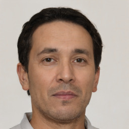 Neutral white adult male with short  brown hair and brown eyes