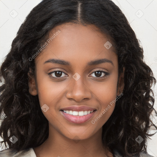 Joyful black young-adult female with long  brown hair and brown eyes