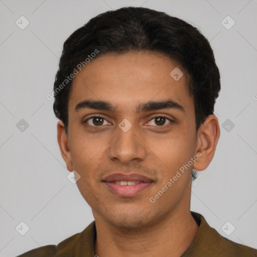 Joyful latino young-adult male with short  black hair and brown eyes