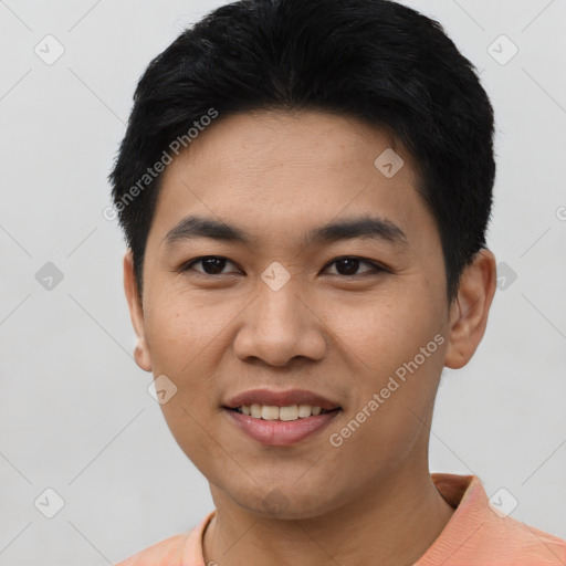 Joyful asian young-adult male with short  black hair and brown eyes