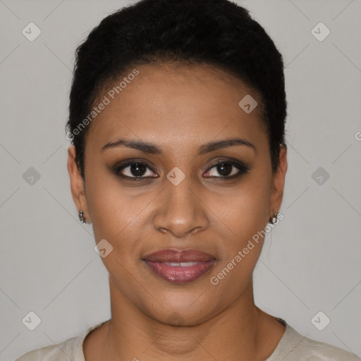 Joyful black young-adult female with short  black hair and brown eyes