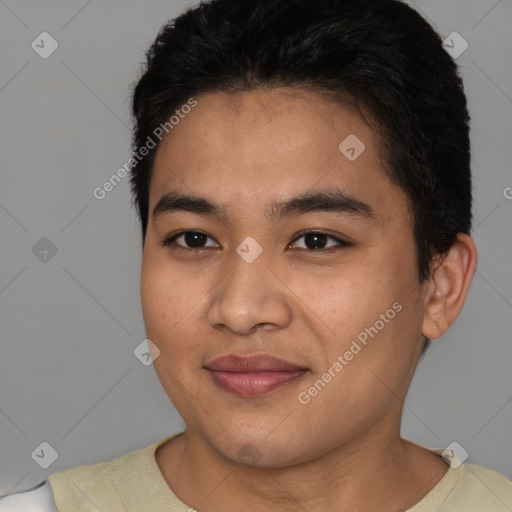Joyful latino young-adult male with short  brown hair and brown eyes
