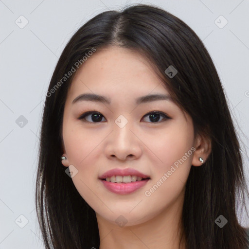 Joyful asian young-adult female with long  brown hair and brown eyes