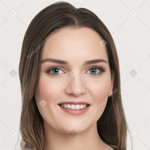 Joyful white young-adult female with long  brown hair and green eyes