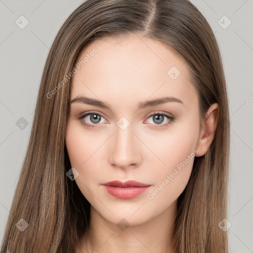 Neutral white young-adult female with long  brown hair and brown eyes