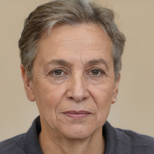 Joyful white middle-aged female with short  brown hair and brown eyes