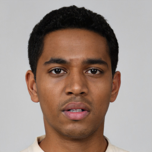 Neutral black young-adult male with short  black hair and brown eyes