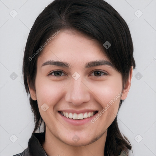 Joyful white young-adult female with medium  brown hair and brown eyes