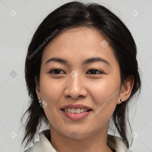 Joyful asian young-adult female with medium  brown hair and brown eyes