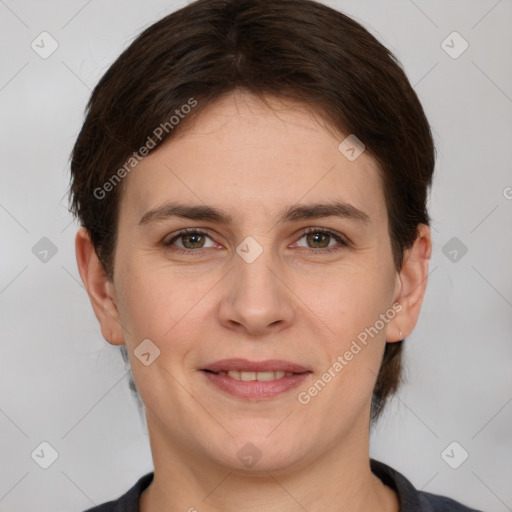 Joyful white young-adult female with short  brown hair and brown eyes