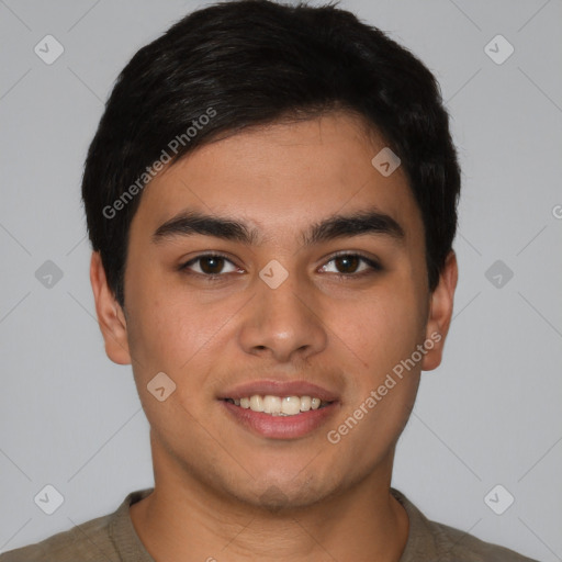 Joyful latino young-adult male with short  brown hair and brown eyes