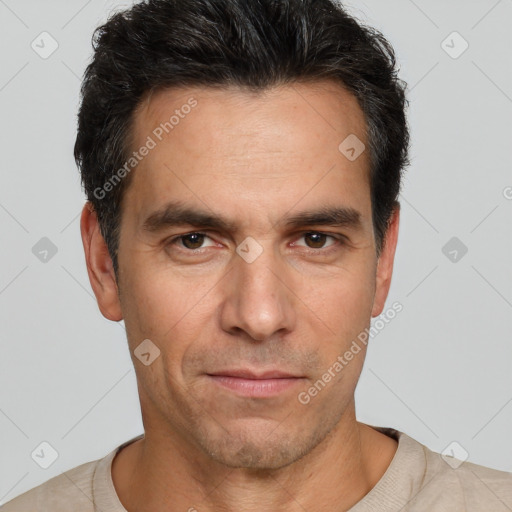 Neutral white adult male with short  black hair and brown eyes