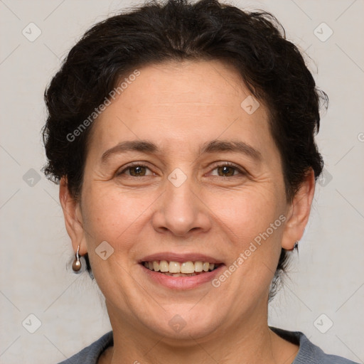 Joyful white adult female with short  brown hair and brown eyes