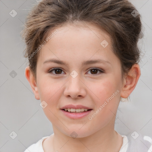 Joyful white child female with short  brown hair and brown eyes