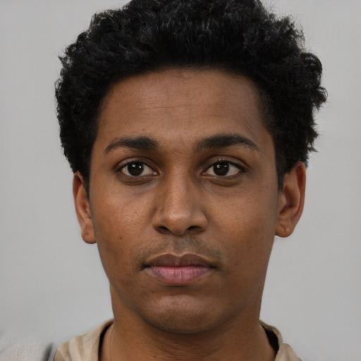 Neutral black young-adult male with short  black hair and brown eyes
