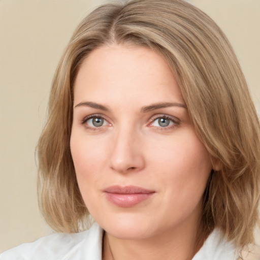 Neutral white young-adult female with medium  brown hair and green eyes