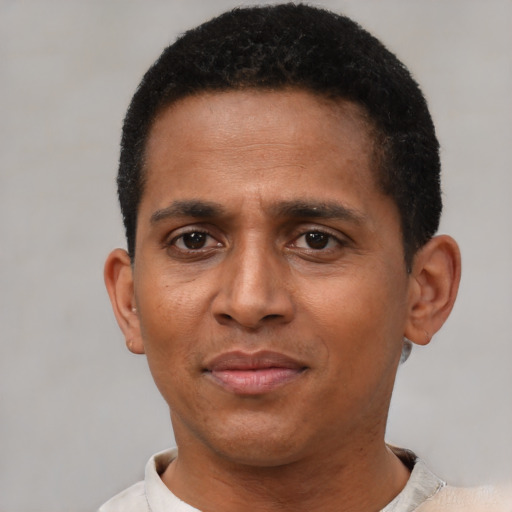 Neutral black young-adult male with short  black hair and brown eyes