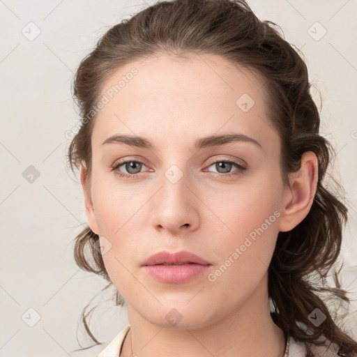 Neutral white young-adult female with medium  brown hair and grey eyes