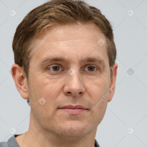 Joyful white adult male with short  brown hair and grey eyes