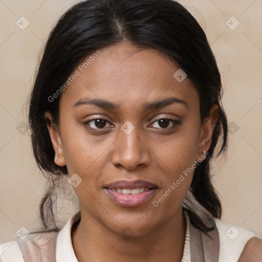 Joyful latino young-adult female with medium  brown hair and brown eyes