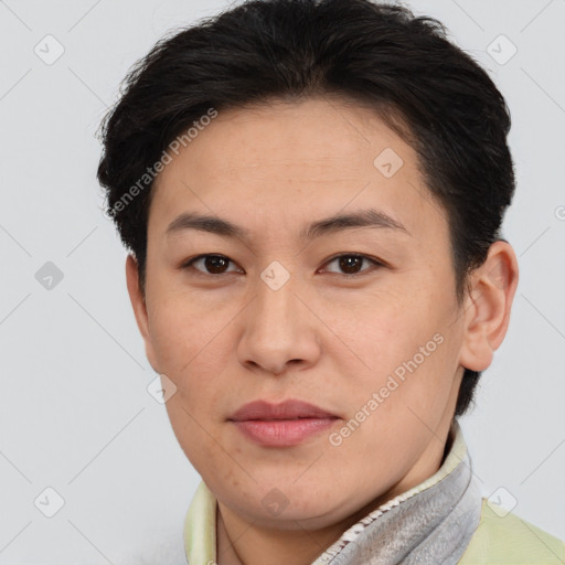 Joyful white adult female with short  brown hair and brown eyes