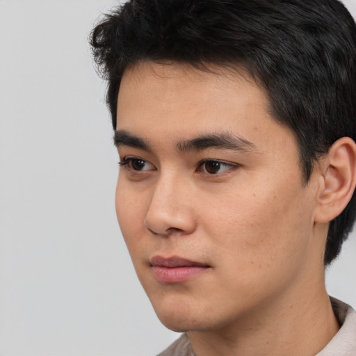 Neutral asian young-adult male with short  black hair and brown eyes