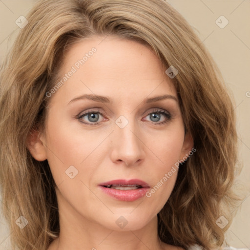 Joyful white young-adult female with medium  brown hair and green eyes