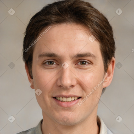 Joyful white adult male with short  brown hair and grey eyes