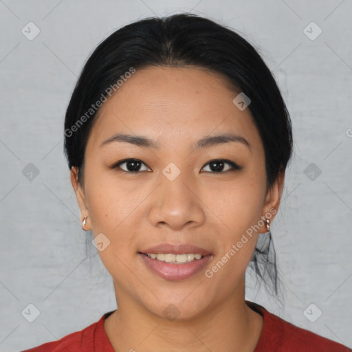 Joyful asian young-adult female with short  black hair and brown eyes