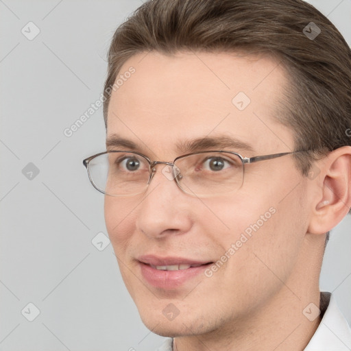 Joyful white adult male with short  brown hair and brown eyes