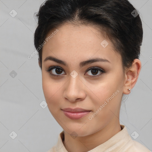 Joyful latino young-adult female with short  brown hair and brown eyes